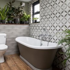 bathroom with textured tiles