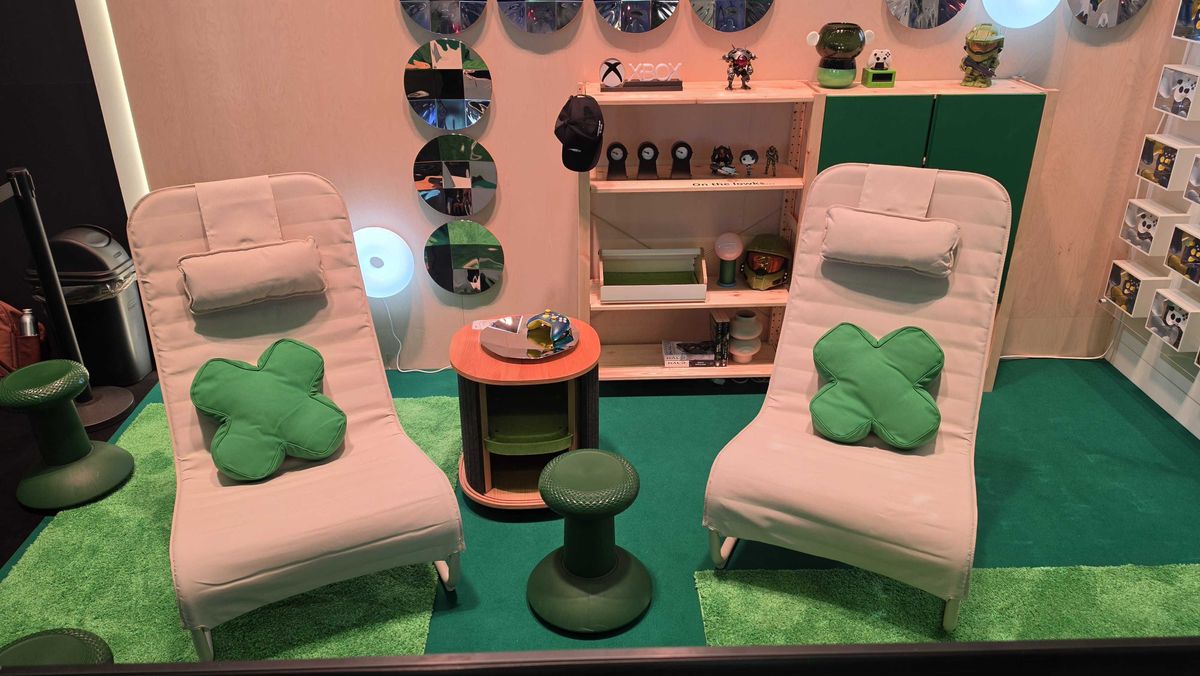 Two chairs from the IKEA x Xbox collection with d-pad cushions on top