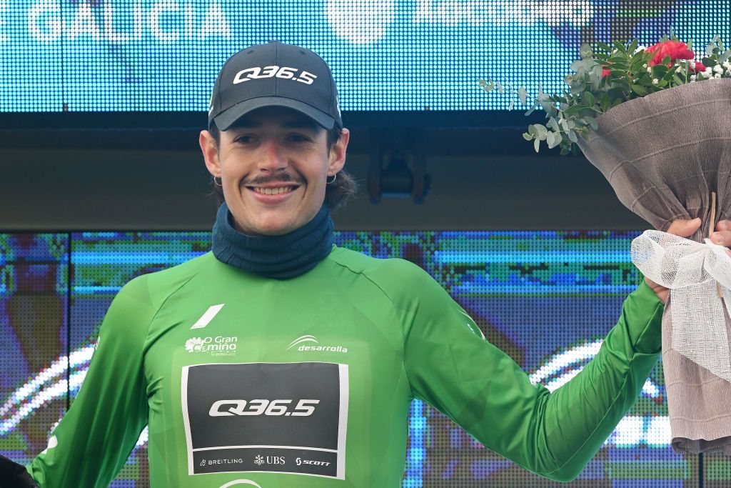CHANTADA SPAIN FEBRUARY 23 EDITORS NOTE Alternate crop Xabier Mikel Azparren of Spain and Q365 Pro Cycling Team celebrates at podium as Green Points Jersey winner during the 3rd O Gran Camio The Historical Route 2024 Stage 2 a 1512km stage from Taboada to Chantada 481m on February 23 2024 in Chantada Spain Photo by Dario BelingheriGetty Images