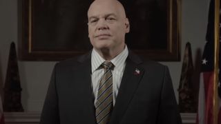 Vincent D&#039;Onofrio&#039;s Wilson Fisk dressed in snazzy dark gray suit with white striped shirt and yellow striped tie in Daredevil: Born Again