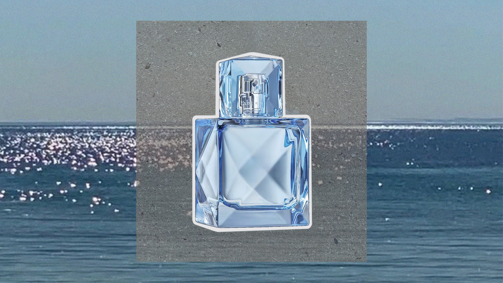 Khlo&eacute; Kardashian XO Blue Eau de Parfum against an ocean background