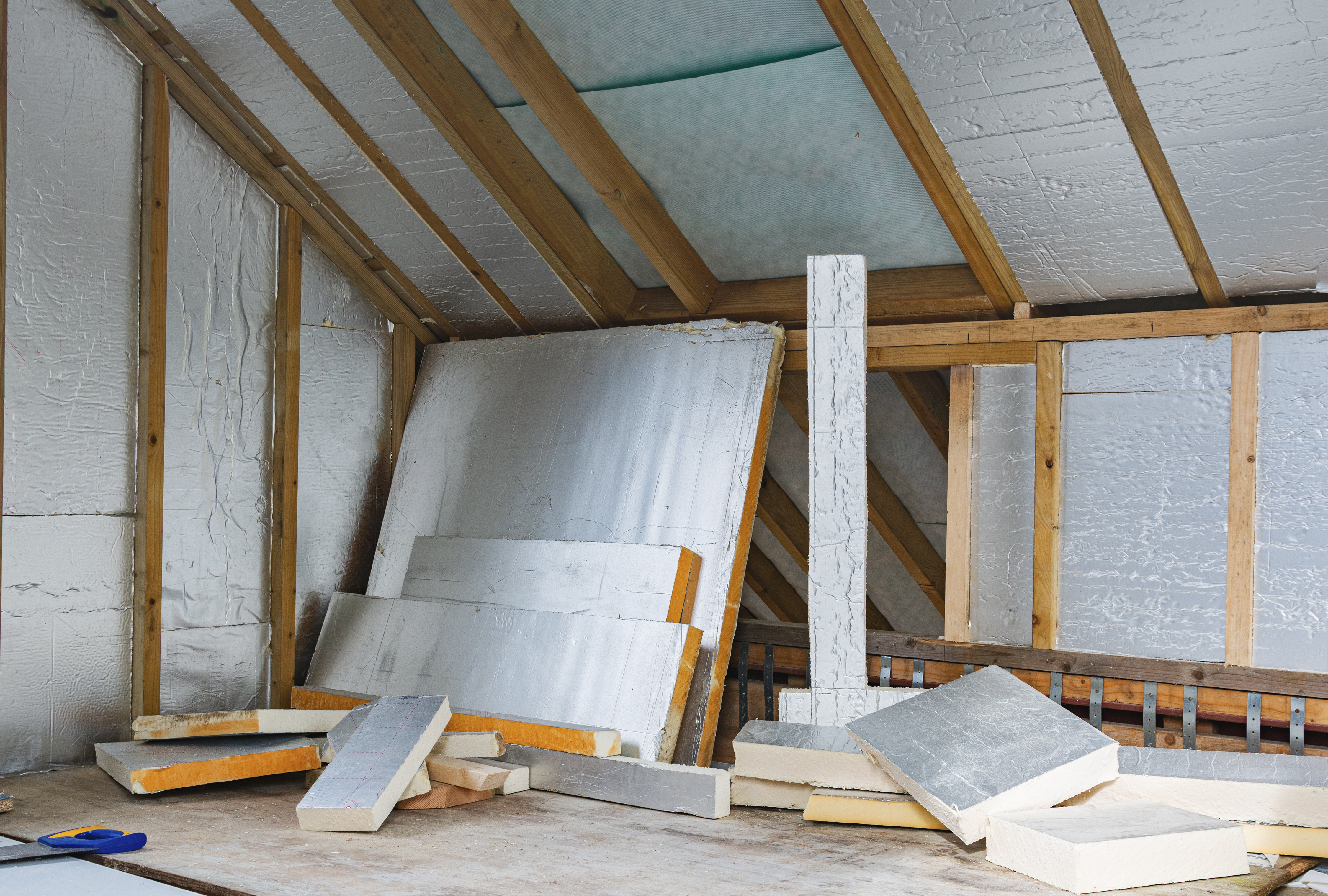 Insulation in a pile in a part-completed loft conversion
