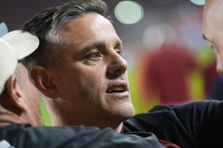 Toronto FC coach John Herdman gestures with fans after his side's game against Montreal CF in May 2024.