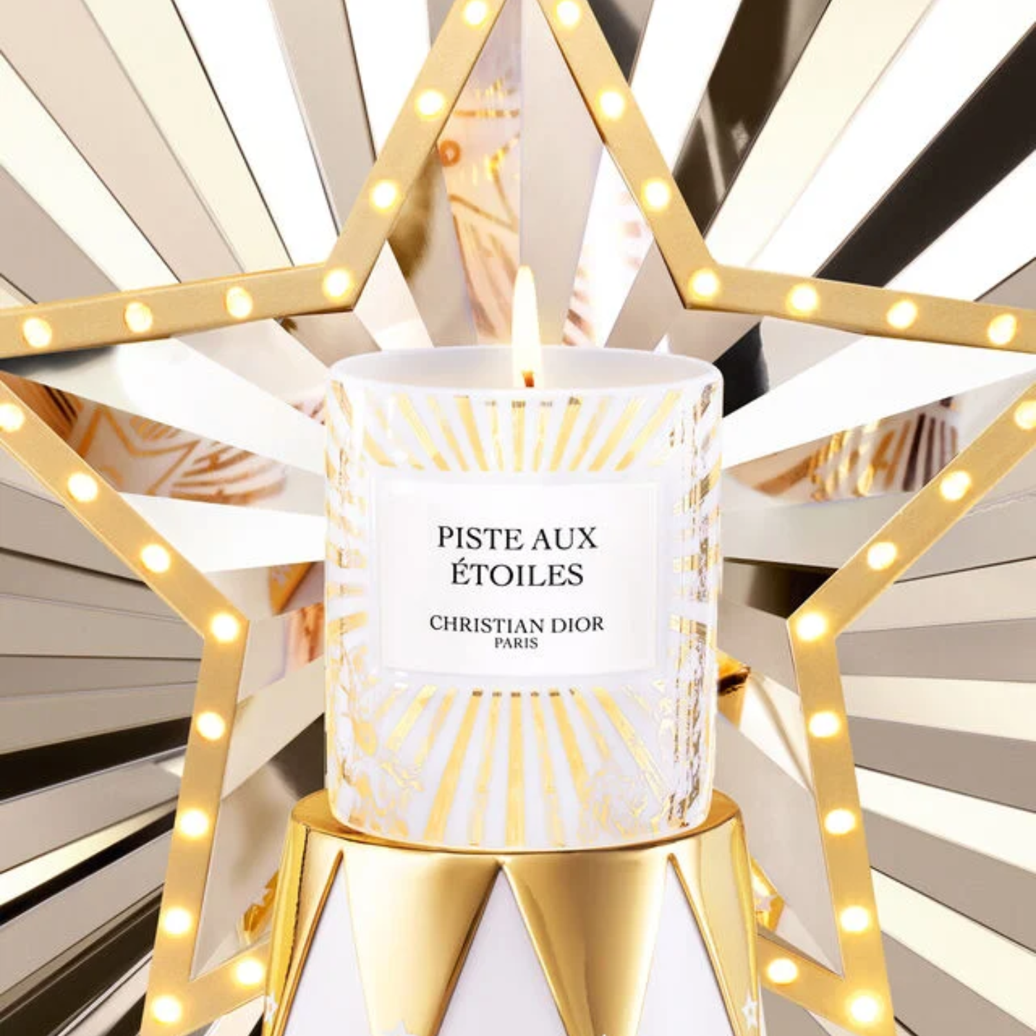 A white and gold candle