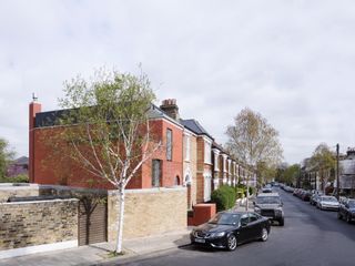 Exterior and street view of the Red House in east Dulwich