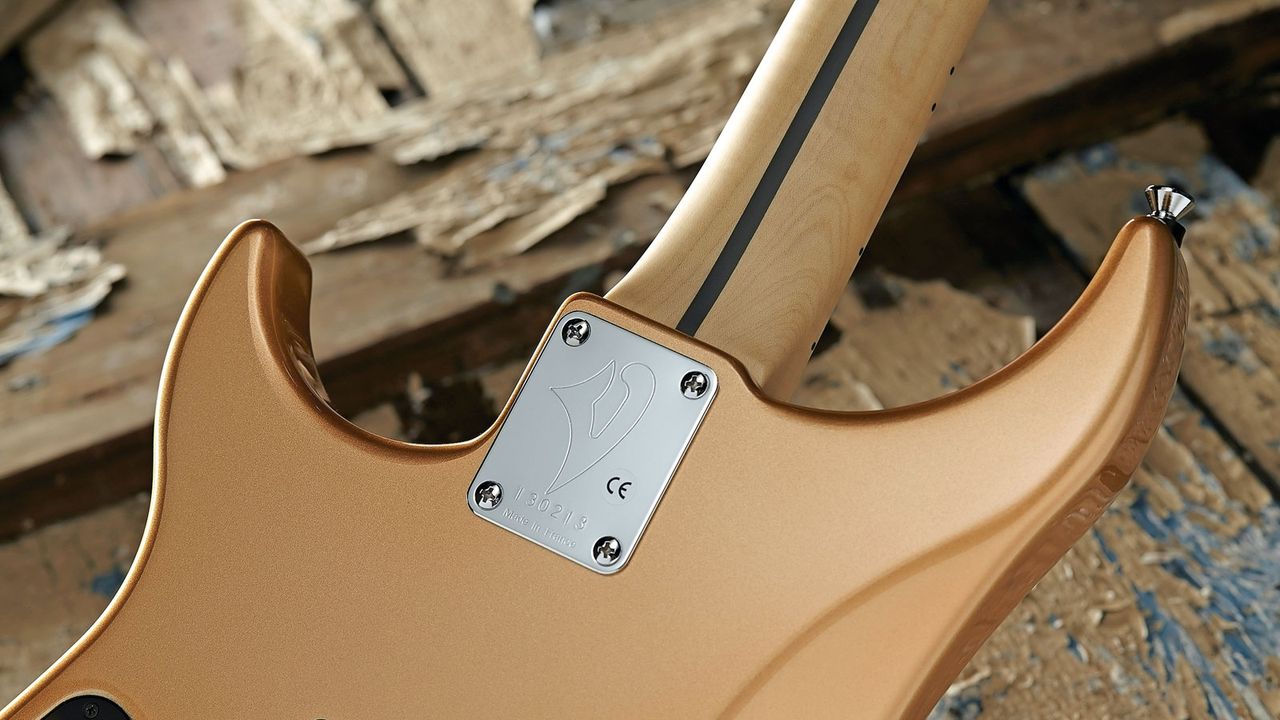 Standard strap buttons just screw into the body wood. Not Vigier's: they bolt into a threaded metal body insert
