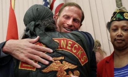 Richard Blumenthal hugs a former U.S. Marine.