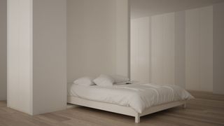 A white murphy bed in a minimalist white bedroom
