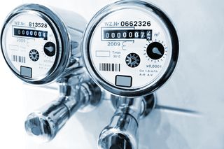 Water meter installed on bathroom taps