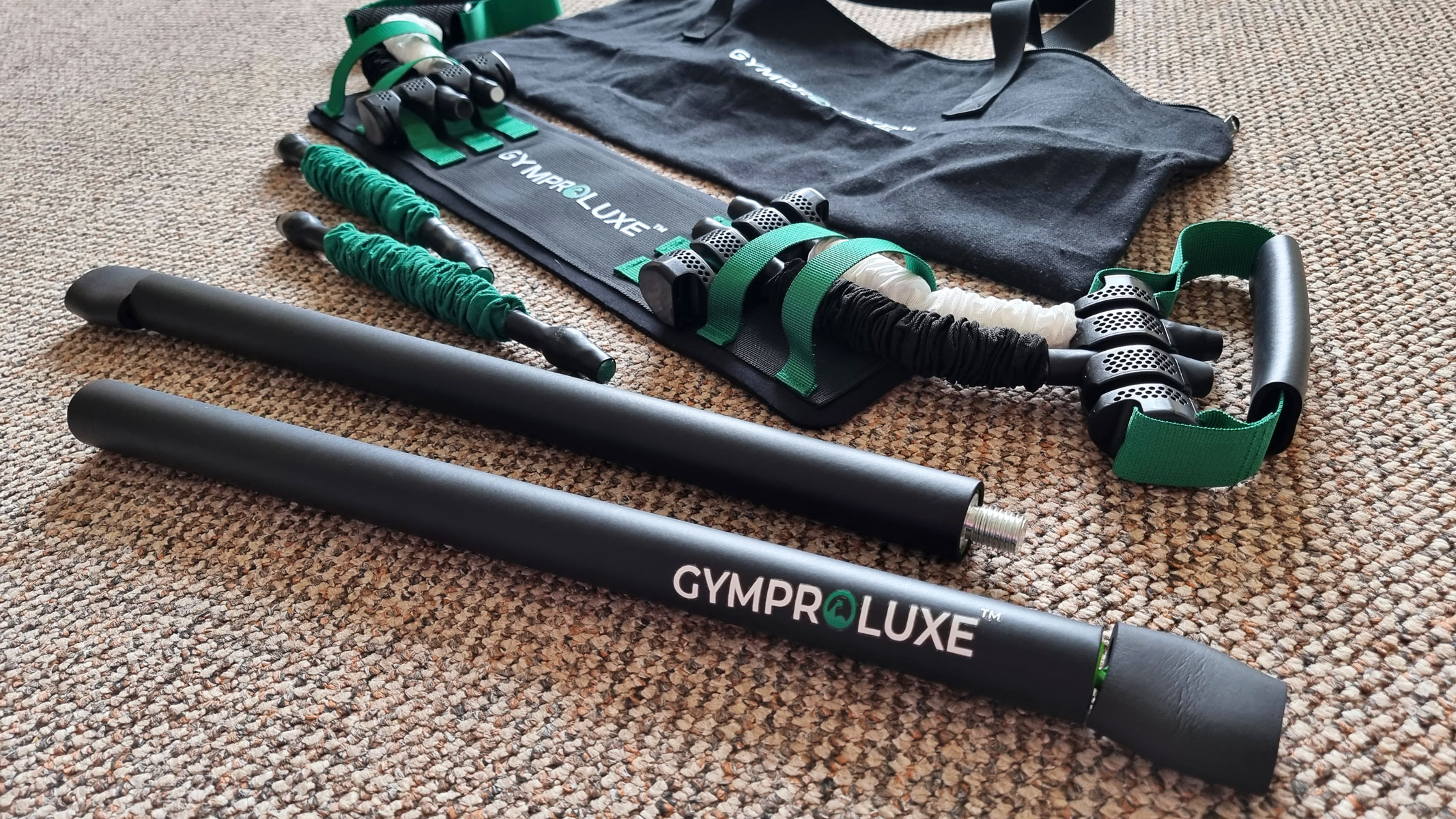 Gymproluxe all-in-one gym set laid on the floor