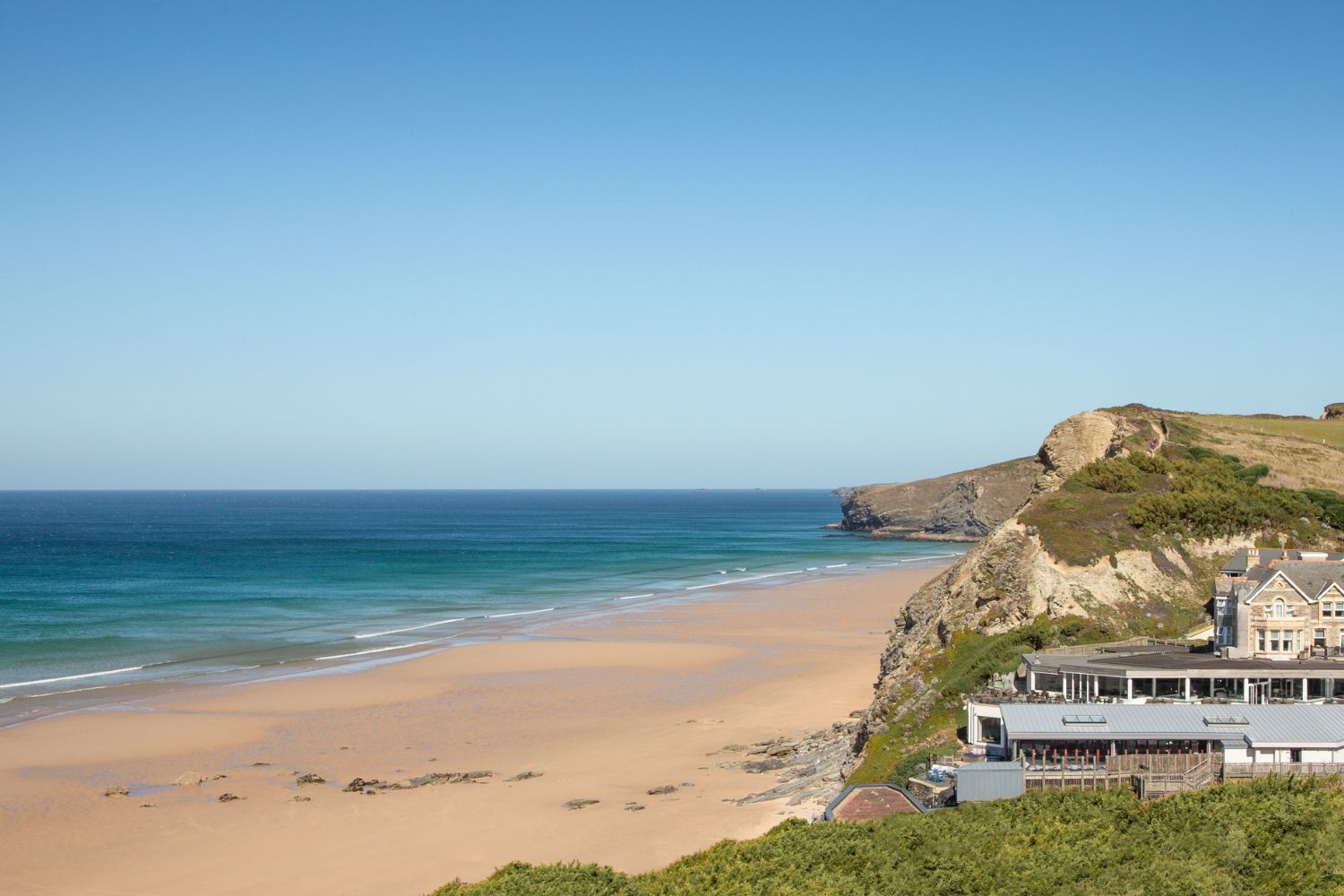 Image of the sea, sand and cliff top near watergate bay hotel