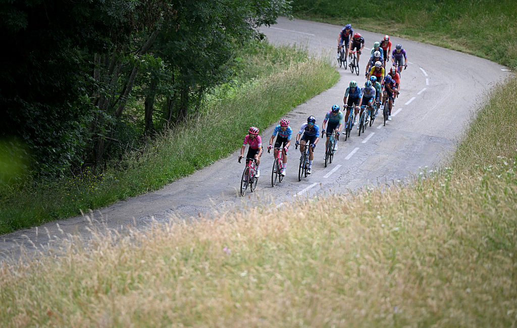 VALMEINIER 1800, FRANCE - JUNE 14: (L-R) Ben Healy of Ireland, Alex Baudin of France and Team EF Education - EasyPost - Polka Dot Mountain Jersey and a general view of the peloton competing during the 77th Criterium du Dauphine 2025, Stage 7 a 131.6km stage from Grand-Algueblanche to Valmeinier 1800 (1830m) / #UCIWT / on June 14, 2025 in Valmeinier 1800, France. (Photo by Dario Belingheri/Getty Images)