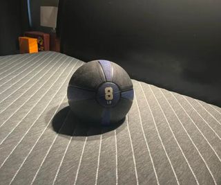 A kettleball on the Siena Memory Foam Mattress.