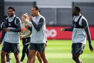 Virgil van Dijk, centre, and Ibrahima Konate, right