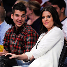 Khloe Kardashian wife of Los Angeles Lakers Lamar Odom #7 and her brother Rob Kardashian follow the action during the NBA basketball game against Atlanta Hawks at Staples Center on November 1, 2009 in Los Angeles, California.