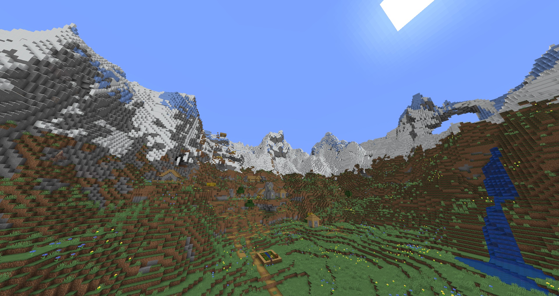 Minecraft - A background of snowy mountains behind a village