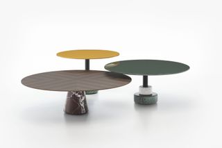 Three different round wooden tables