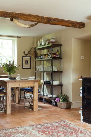 kitchen dining room table with glass shelves cabinet