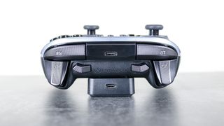 A closeup shot of the backside of the PowerA OPS v3 Pro controller's magnetic charging stand