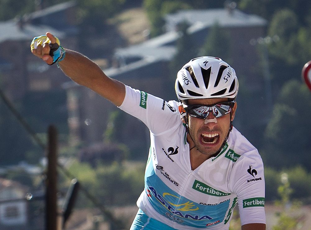 Fabio Aru celebrates as he crosses the stage 20 finish line.