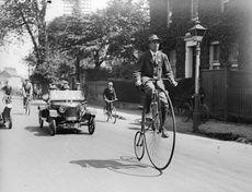 May 1916: A man riding a penny farthing during a veteran cycling meet in Esher, Surrey. (Photo by Topical Press Agency/Getty Images)