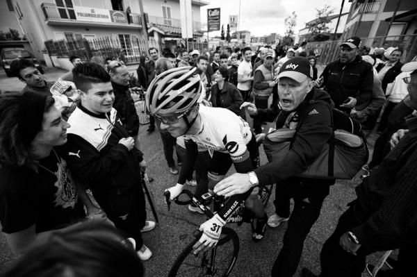 Out of the way: Helping the riders through the crowds
