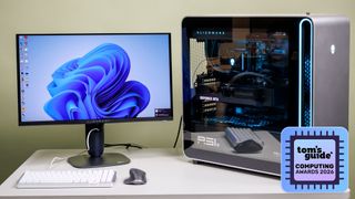 A desktop PC and a monitor on a table with a Tom's Guide Computing Awards 2026 badge
