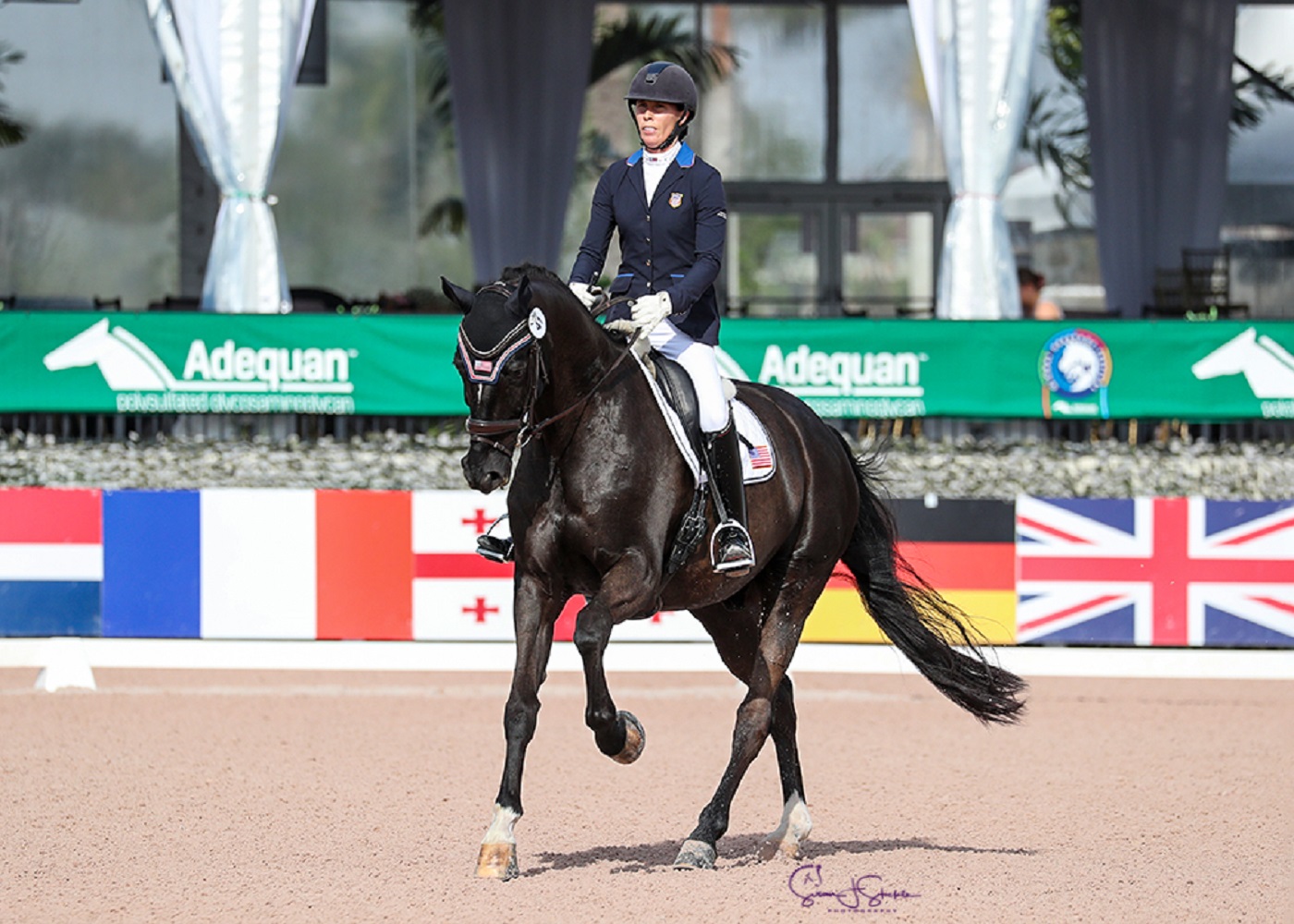 Kate Shoemaker and Solitaer 40 scored 74.146% in the CPEDI3* FEI Para Individual Grade IV class