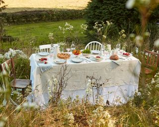 rustic table and chairs in natural setting