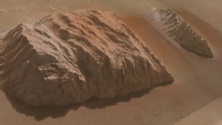 This view of the Ganges Chasma region on Mars shows mountainous features called light mounds. Westerly winds on Mars have created a wake around the structure on the right that is visible around the dunes at the mountain's base.