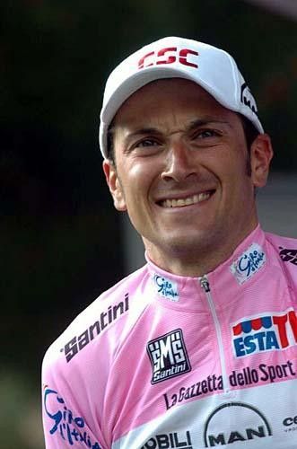 Ivan Basso (CSC) has a bit of trouble uncorking the champagne