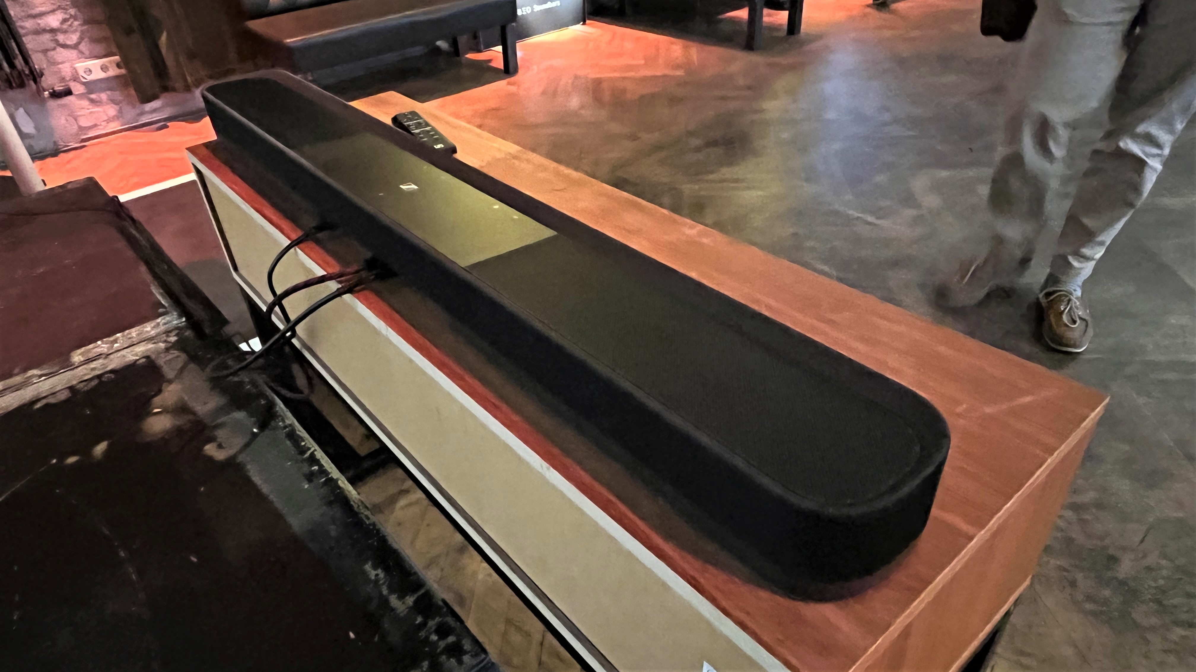 Sennheiser Ambeo soundbar on wooden stand seen from behind