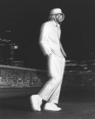 black and white photo of white outfit by Paul Smith and Ahluwalia