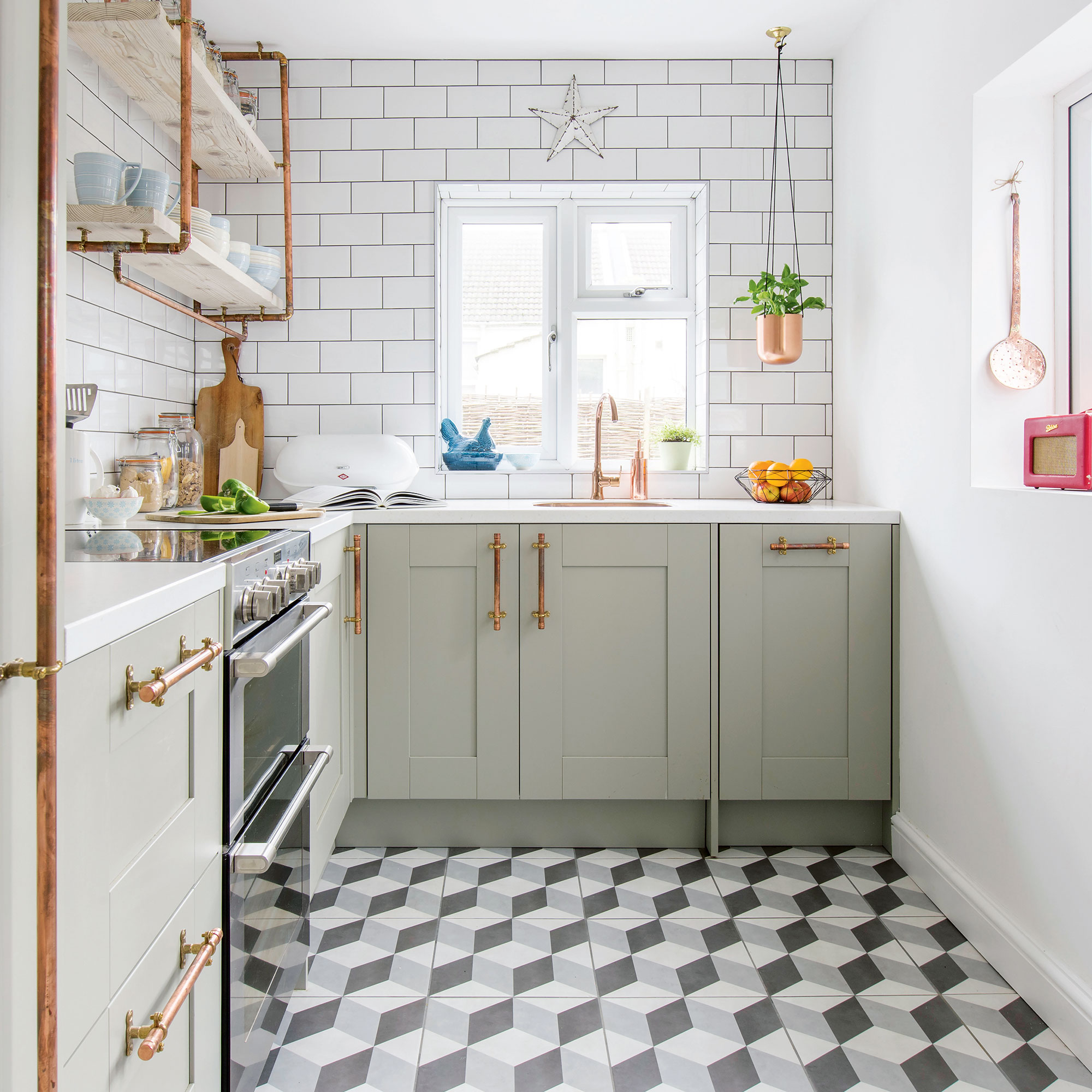 Neutral kitchen with geometric tiled floor, metro tiled walls and grey cabinetry