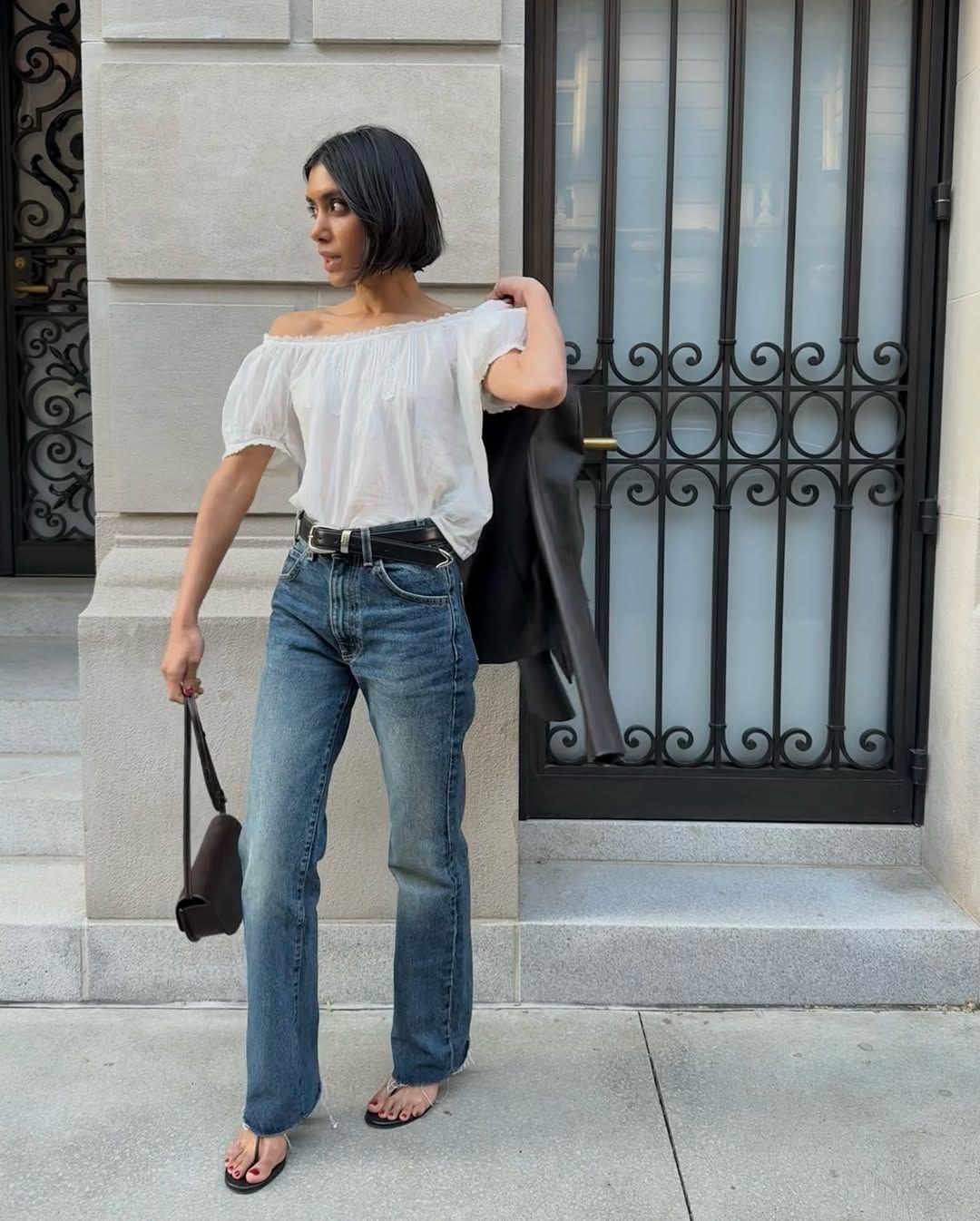 Shay in June wearing heeled flip flops