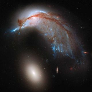 two galaxies collide in new hubble photo