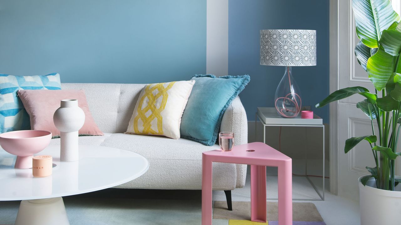 Small living room styling mistakes image with pastel wall paint, sofa and table