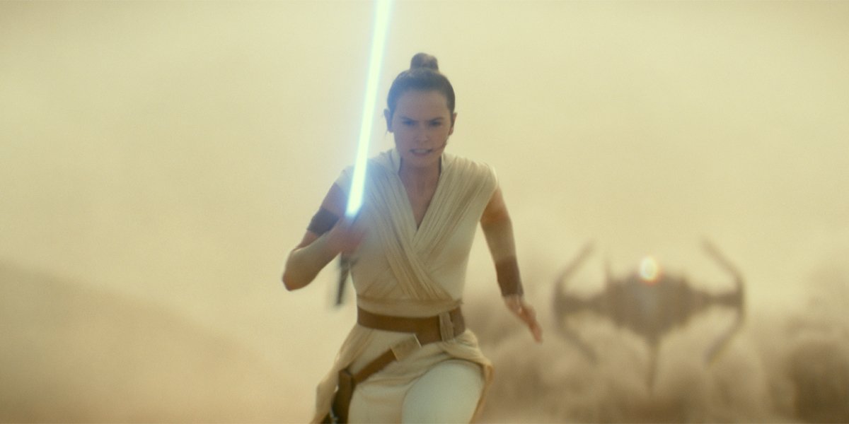 Rey running from Kylo Ren in Star Wars The Rise of Skywalker