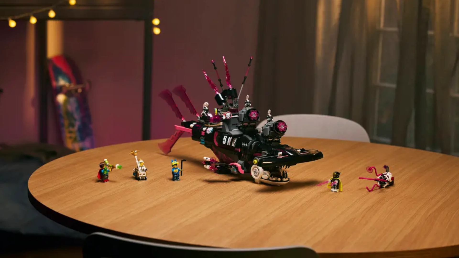 Lego Nightmare Shark Submarine set and minifigures on a wooden table
