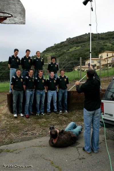 Covering all angles - photographers get the team from above and below.