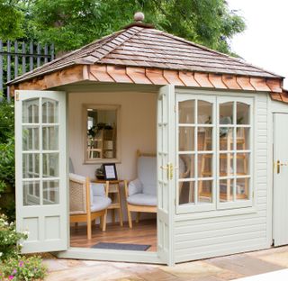 summer house ideas: cream building with tiled roof from Malvern Garden Buildings
