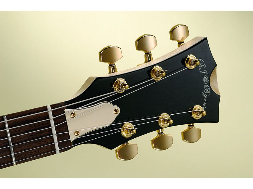 The headstock front is lacquered to match the body and topped with Gotoh tuners.