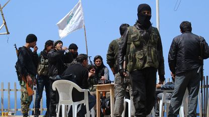 Rebel fighters in Syria