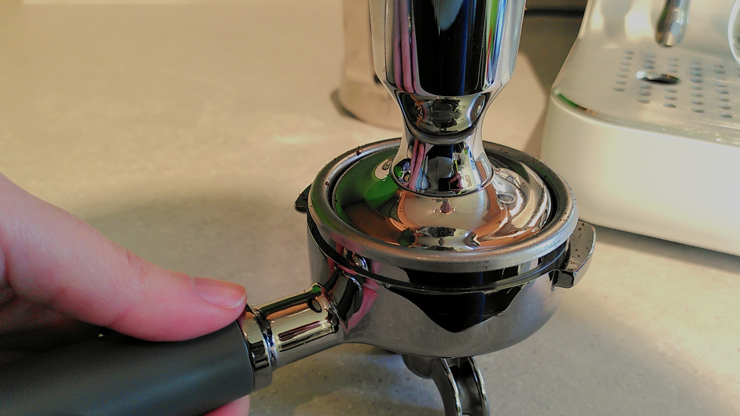 Tamping coffee for Smeg Mini Pro Espresso Coffee Machine