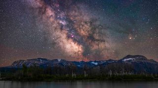 he galactic core region of the Milky Way over Maskinonge Pond and Sofa Mountain, Alberta, Canada