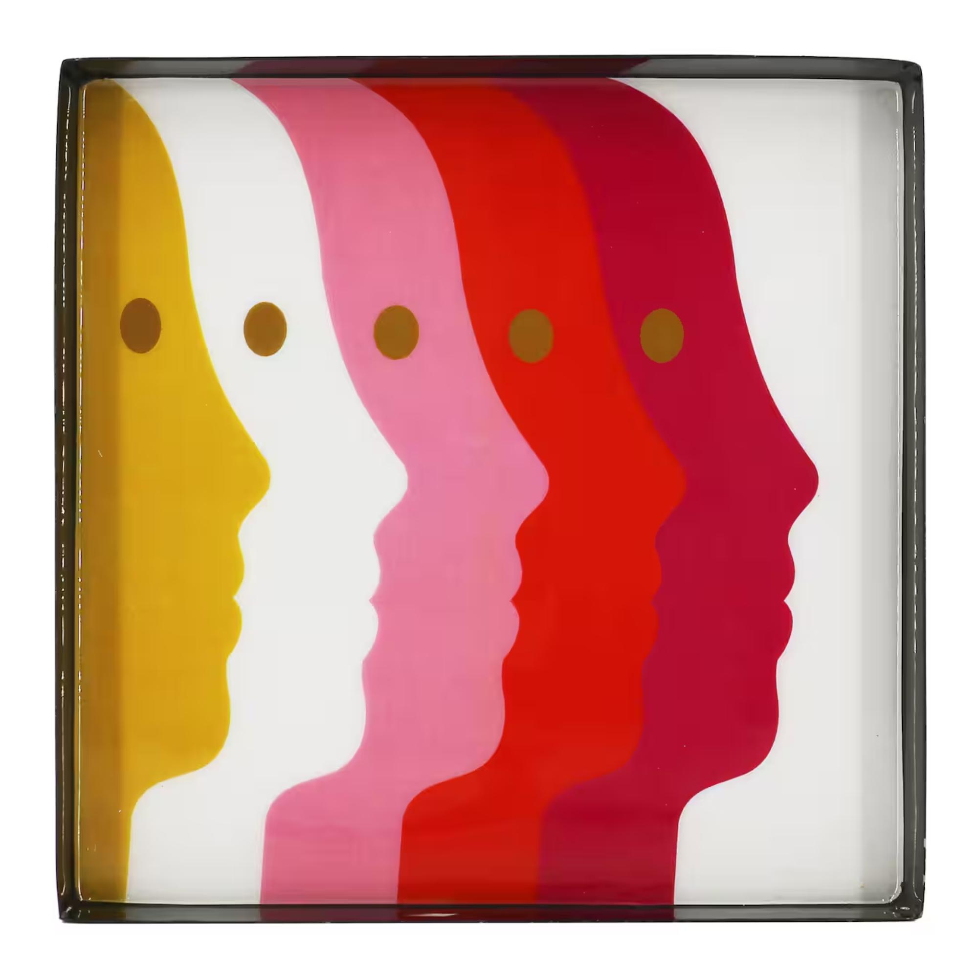 a serving tray with faces on it