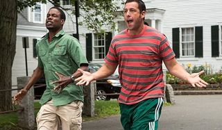 Grown Ups 2 Chris Rock Adam Sandler running down the street in a panic