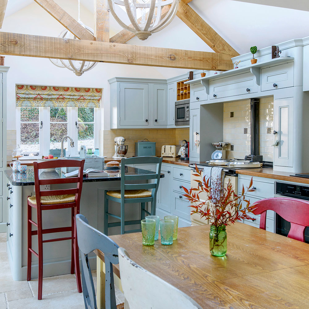 kitchen with dining room and counter with chair