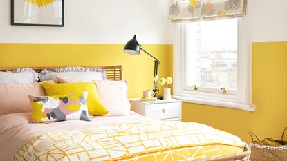 Yellow bedroom with rattan bedroom and pink details