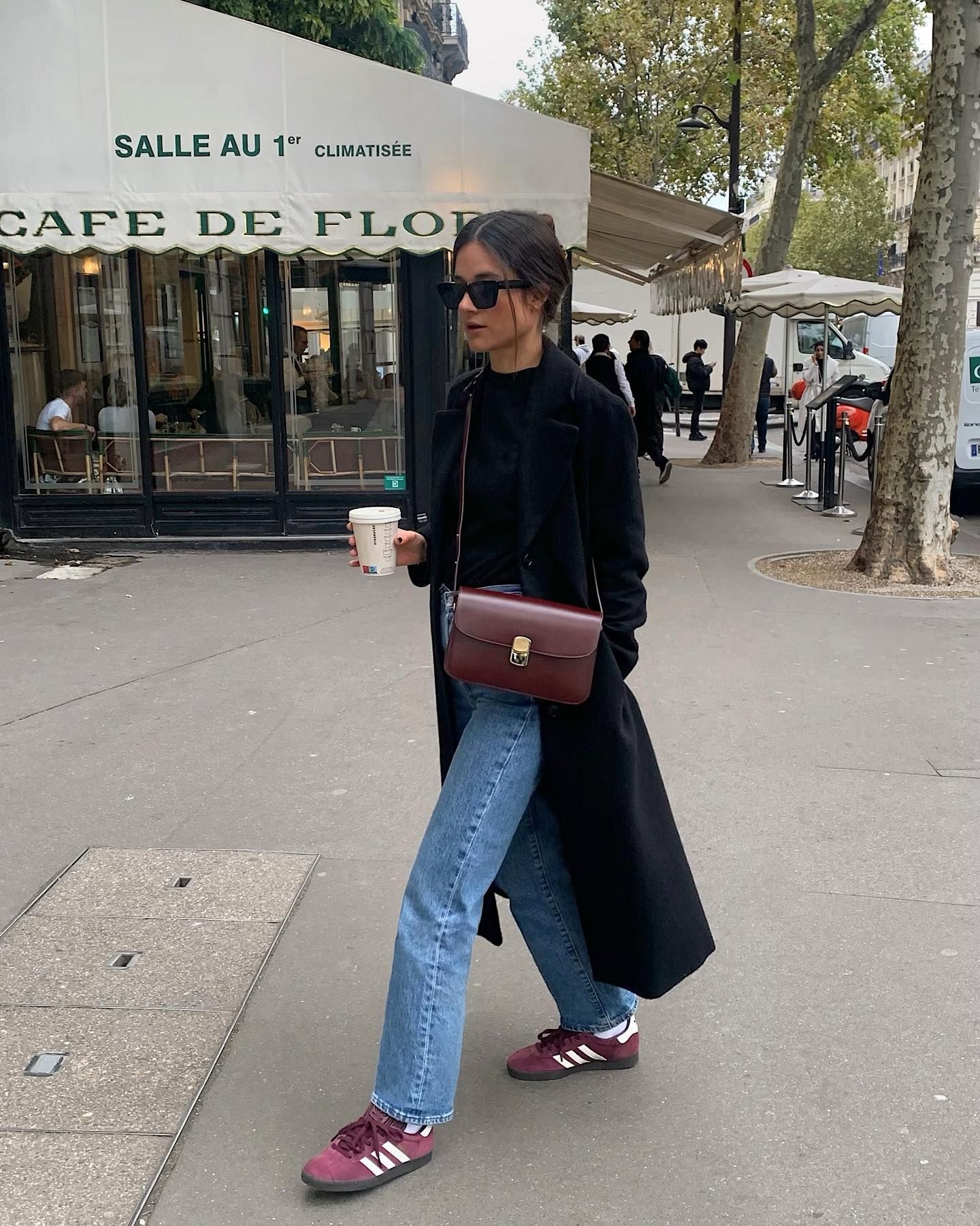 Leasy wears maroon Adidas Gazelles
